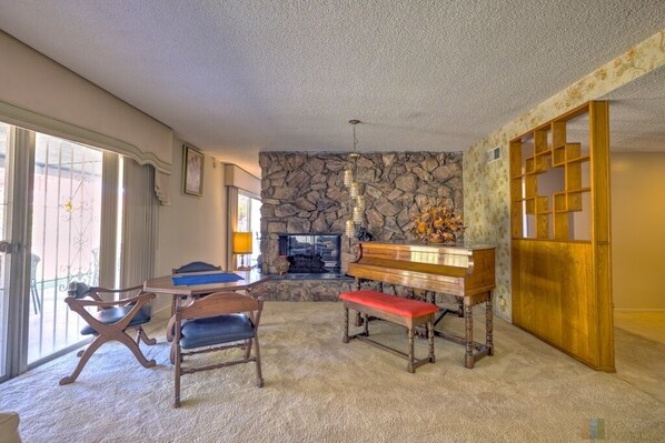 Piano and seating area in the formal living room