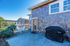 With a grill and outdoor dining