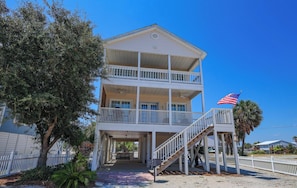 Welcome to Coast A While - Coast A While is a 4 Bedroom, 3 & 1/2  bathroom, pet friendly home located off West Beach in Gulf Shores.