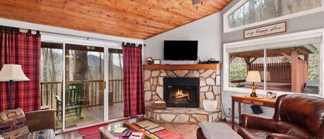 Bright, light and open-concept living area.  Smart TV + cable, gas fireplace. 