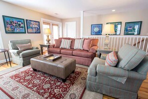 Upstairs you'll find your large open living area with plenty of comfy seating.