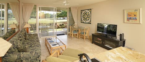 Open and Airy Living area with park and ocean view!