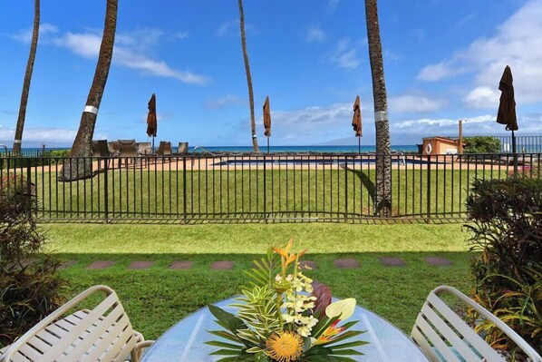 Out door lanai with view of pool and ocean beyond!