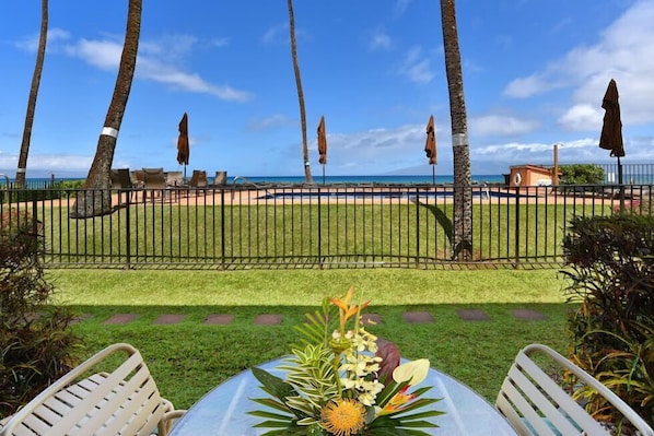 Out door lanai with view of pool and ocean beyond!