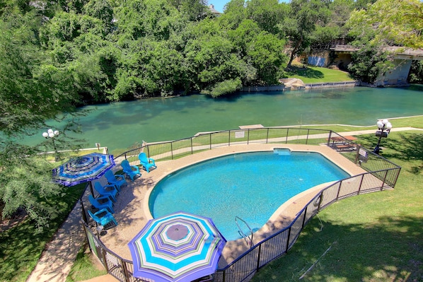 Swimming pool overlooking the Comal River!