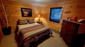 bedroom 1 has a queen and Pendleton bed spread