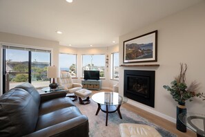 Downstairs living room with fireplace