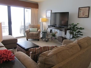 Living Area - The spacious living area offers a sofa sleeper, 2 chairs and a television for enjoying in your down time.