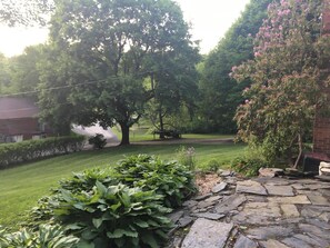 View of front lawn and barn from patio