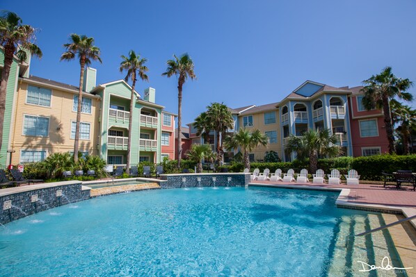 Fountain pool located by the condo heated during the cooler months.