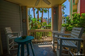 Enjoy eating and drinking at this patio! Steps to the pool thru the patio gate