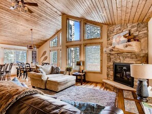 Gas fireplace and floor to ceiling windows.  