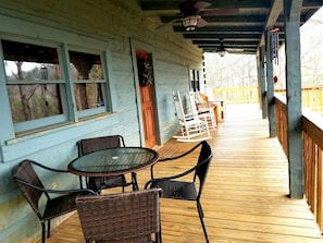 Spacious porch for outdoor dinning or sitting back taking it easy with company!