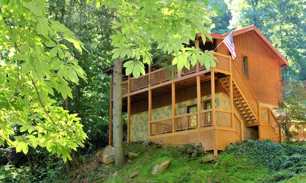 Whispering Waters - Whispering Waters #208 is a two bedroom, two bath luxury cabin nestled on a one acre lot at the base of a mountain that overlooks beautiful Cove Creek.