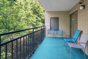 Large private balcony overlooking the river.