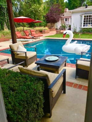 View from bathroom door across Pool Fantastic warm FIRE PIT sitting area !!!