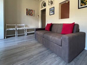 Living area includes sofa-sleeper for two.
