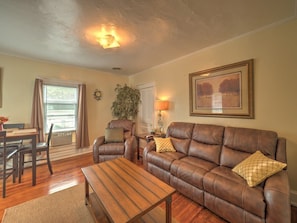 Spacious Dining room / Living room with a couch, recliner, and 50" TV