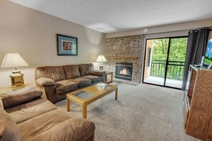 Living area with cozy fireplace for those chilly seasons.