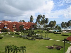 Garden, Pool & Beach View from 1st. level Balcony