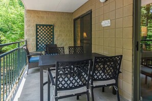 Large private balcony overlooking the river.