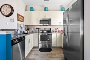 Fully equipped kitchen with steel appliances. Awesome for your meal preparation.