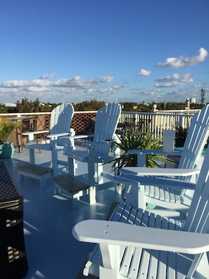 Captian chairs have on Rooftop Patio