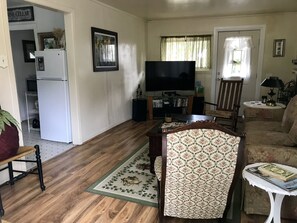 Living room with large screen tv,xbox, pull out sofabed, expandable dining table