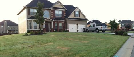 Driveway accommodates 4 vehicles.  