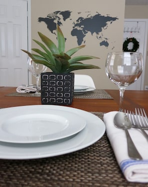 Plates, cups, wine glasses, utensils, and basic kitchen cookware available