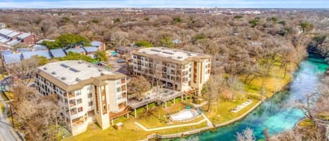 Outstanding location in downtown New Braunfels on the banks of the Comal River!