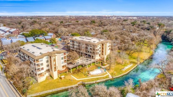 Outstanding location in downtown New Braunfels on the banks of the Comal River!