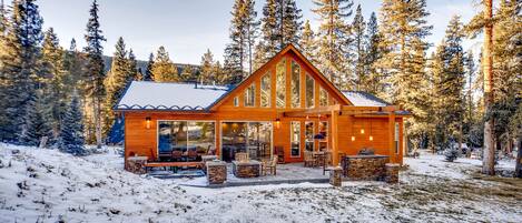 Back of house and backyard. Backs up to National Forest. Slight mountain views.