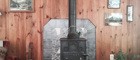 Cozy living room with wood stove.