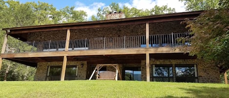 Front of house facing the mtns. Note the reflection in the door!