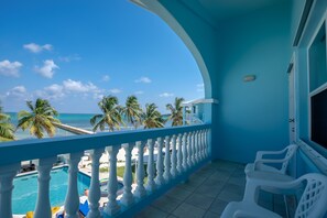 Veranda overlooking pool and Caribbean.