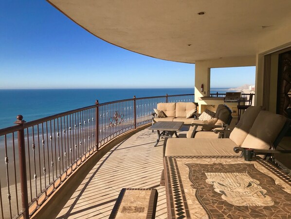 1200 sq. ft. patio with views of the port and beautiful sunset