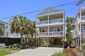 Paradise Beach House is located in Sunny Surfside Beach.  This home is located on Ocean Blvd across the street from the Atlantic Ocean.