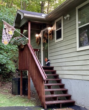 The Bear Whisperer's entrance welcomes our guests with seasonal touches!