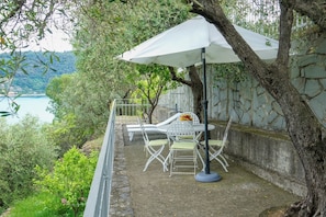 Equipped terrace overlooking the bay.