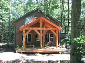 Timeframe constructed porch is for relaxing and swapping stories of the day.