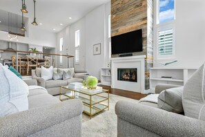Living Room w/ TV, Fireplace, and Bose Speaker!