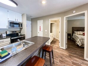 Open-concept layout seamlessly connects kitchen, bedroom, and bath for ultimate comfort and convenience
