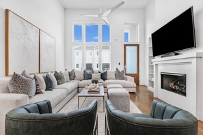 Living Room w/ TV, Bose Speaker, and Gas Fireplace!