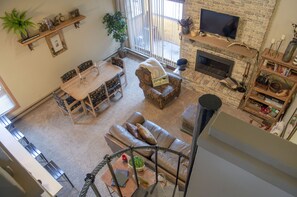 Living room view from top of spiral staircase.