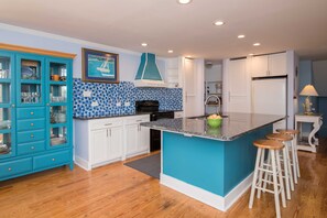 Kitchen has granite countertops.  