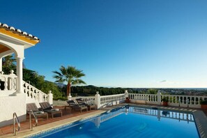 Private pool with sun loungers and panoramic sea views, perfect for soaking up the Costa del Sol sunshine.