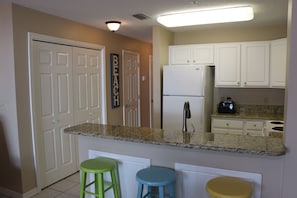 Dunes 106 - View of the kitchen from the living room