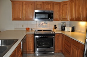 New Glass top stove  and full size oven with new Microwave 