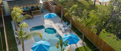 Welcome to our "Just Beachy" backyard! Great pool, large covered deck, BBQ  area